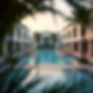 Relaxing community pool area surrounded by Al Waha Villas