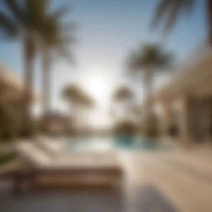 Elegant poolside area with palm trees and sun loungers