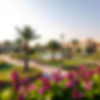Community park in Tilal Al Ghaf featuring lush greenery and recreational spaces